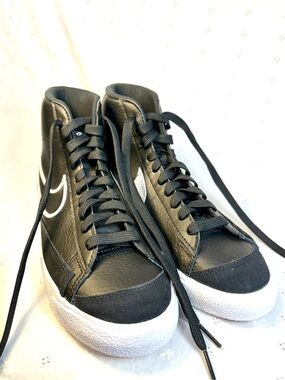 Nike Black High-Top Sneakers with White Tongue Text